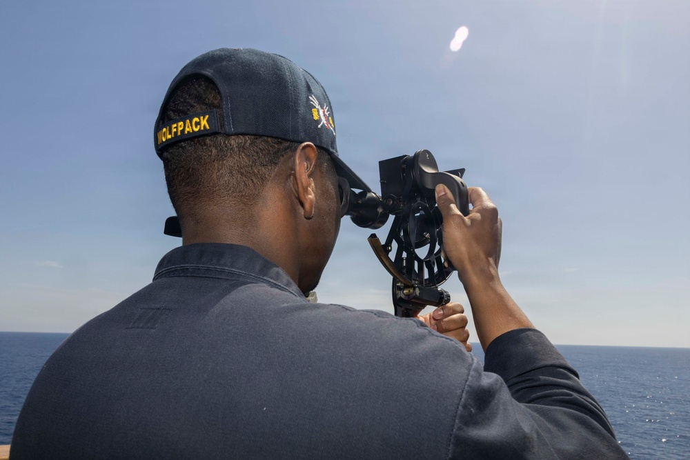 Quartermaster 2nd Class Antonio Blackburn leads navigation training aboard USS Bulkeley, April 13, 2026