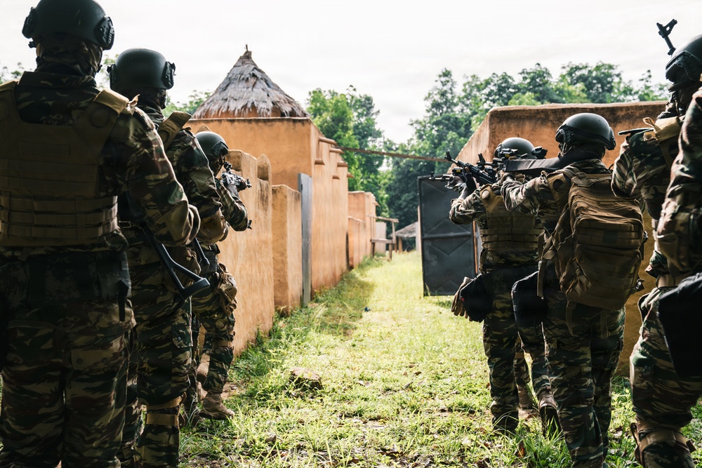 Green Berets and Cameroonian special operations soldiers execute urban maneuvers during Flintlock 26