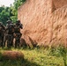 Green Berets and Cameroonian special operations soldiers execute urban maneuvers during Flintlock 26