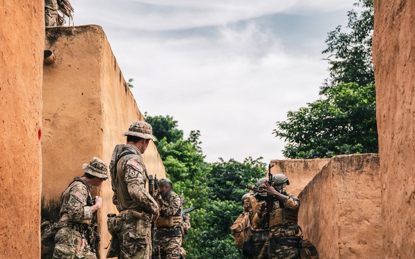 Green Berets and Cameroonian special operations soldiers execute urban maneuvers during Flintlock 26