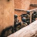 Green Berets and Cameroonian special operations soldiers execute urban maneuvers during Flintlock 26