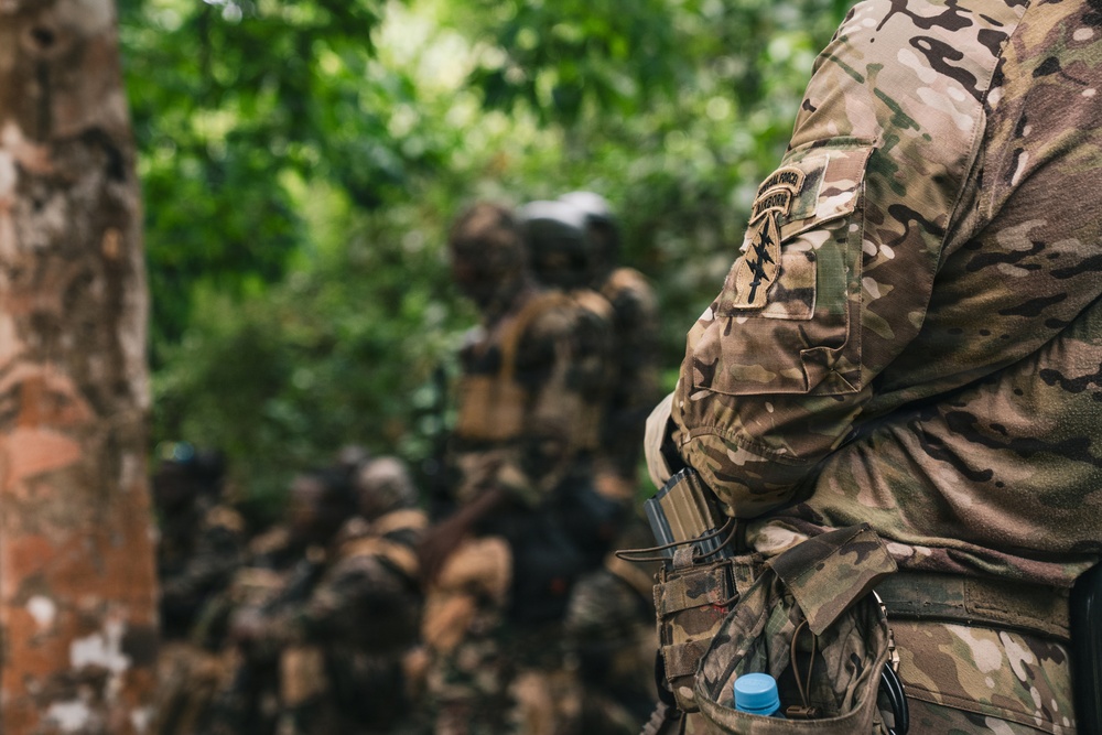 Green Berets and Cameroonian special operations soldiers execute urban maneuvers during Flintlock 26