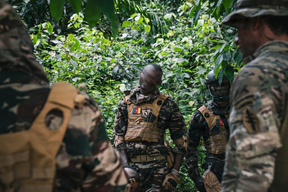 Green Berets and Cameroonian special operations soldiers execute urban maneuvers during Flintlock 26