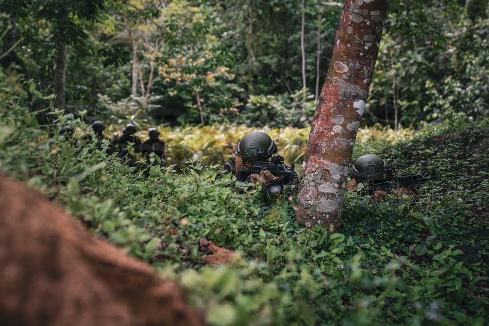 Green Berets and Cameroonian special operations soldiers execute urban maneuvers during Flintlock 26
