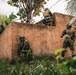 Green Berets and Cameroonian special operations soldiers execute urban maneuvers during Flintlock 26