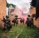 Green Berets and Cameroonian special operations soldiers execute urban maneuvers during Flintlock 26