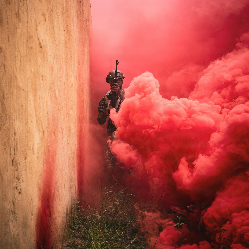 Green Berets and Cameroonian special operations soldiers execute urban maneuvers during Flintlock 26