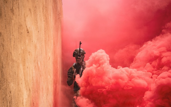 Green Berets and Cameroonian special operations soldiers execute urban maneuvers during Flintlock 26