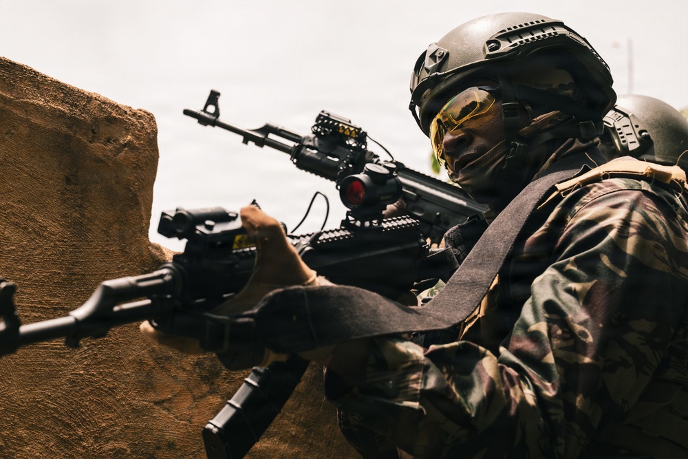 Green Berets and Cameroonian special operations soldiers execute urban maneuvers during Flintlock 26