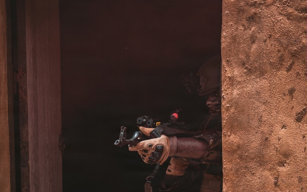 Green Berets and Cameroonian special operations soldiers execute urban maneuvers during Flintlock 26