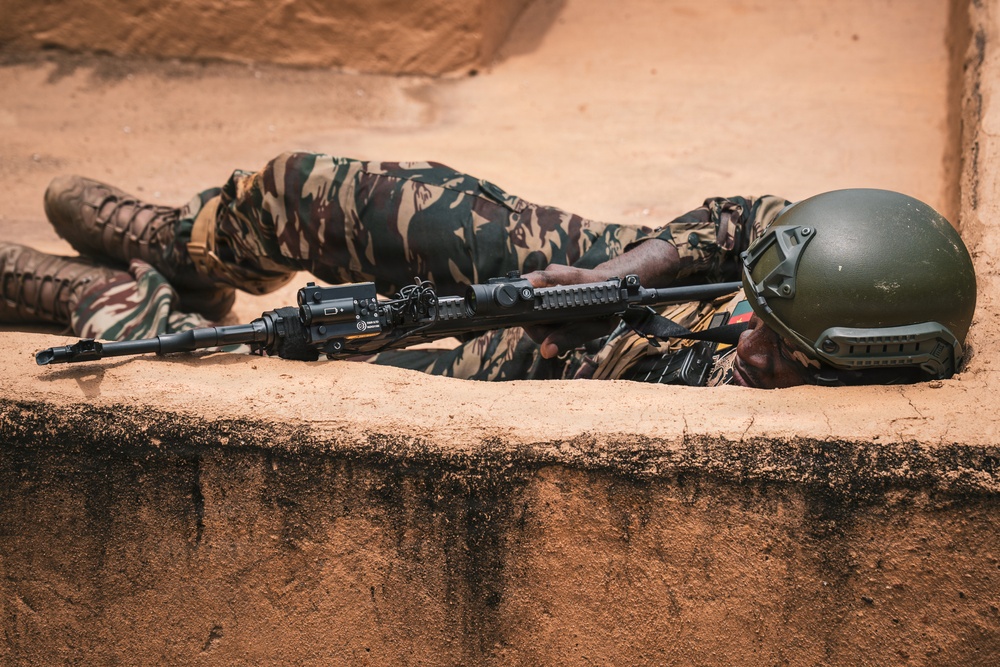 Green Berets and Cameroonian special operations soldiers execute urban maneuvers during Flintlock 26