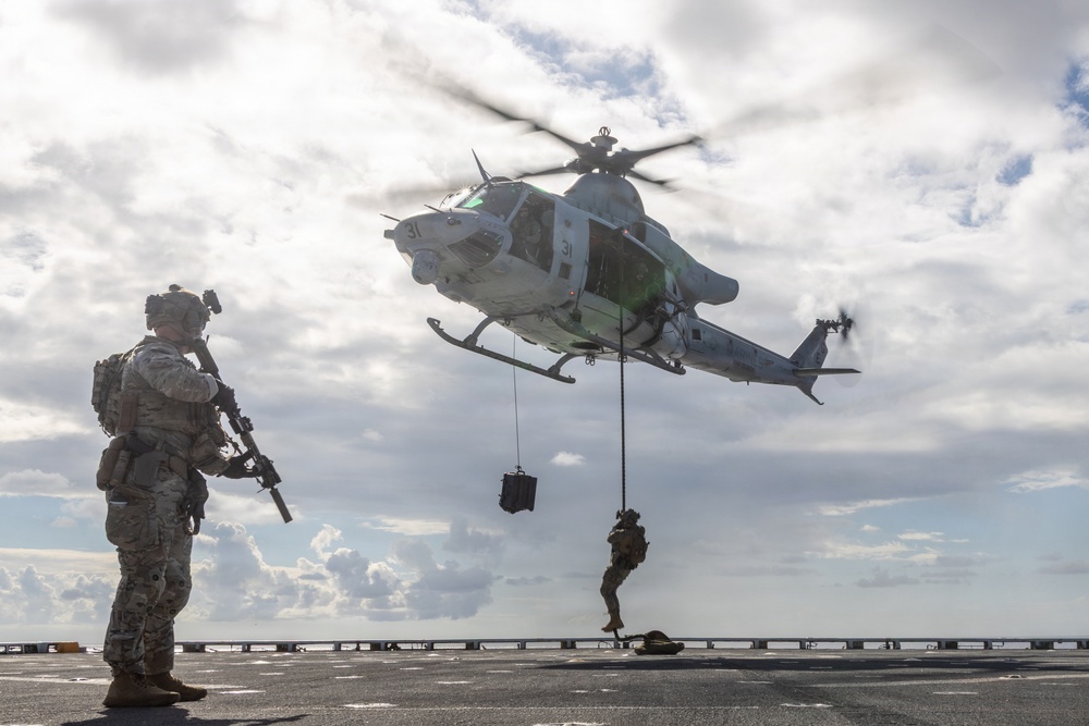 22nd MEU(SOC) | Marines and U.S. Coast Guard Fast Rope Aboard USS Fort Lauderdale