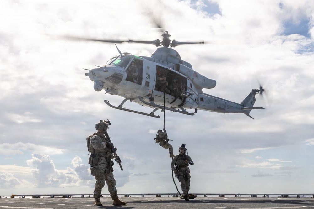 22nd MEU(SOC) | Marines and U.S. Coast Guard Fast Rope Aboard USS Fort Lauderdale