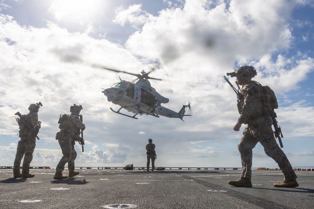 22nd MEU(SOC) | Marines and U.S. Coast Guard Fast Rope Aboard USS Fort Lauderdale