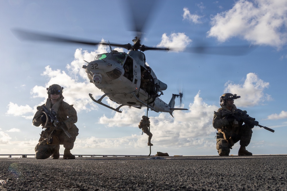 22nd MEU(SOC) | Marines and U.S. Coast Guard Fast Rope Aboard USS Fort Lauderdale