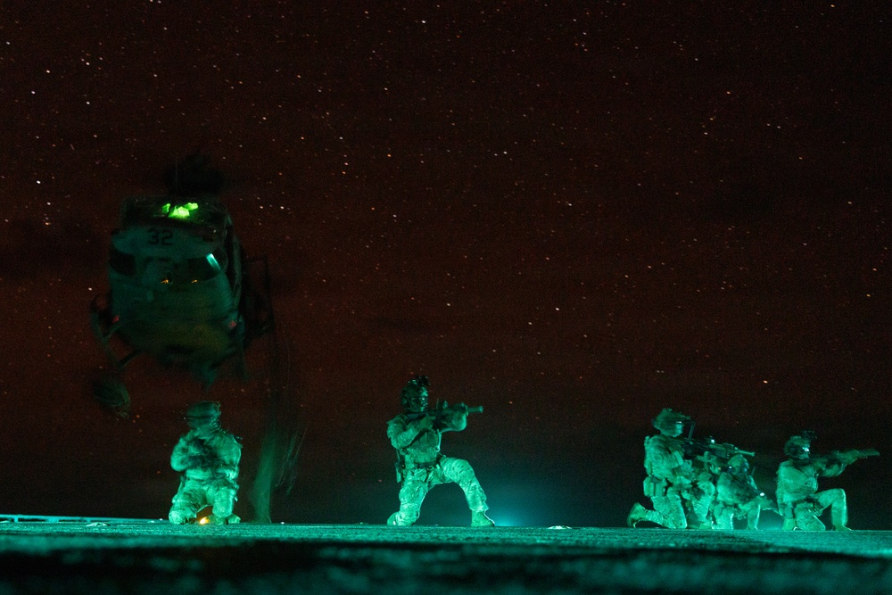 22nd MEU(SOC) | Marines and U.S. Coast Guard Fast Rope Aboard USS Fort Lauderdale