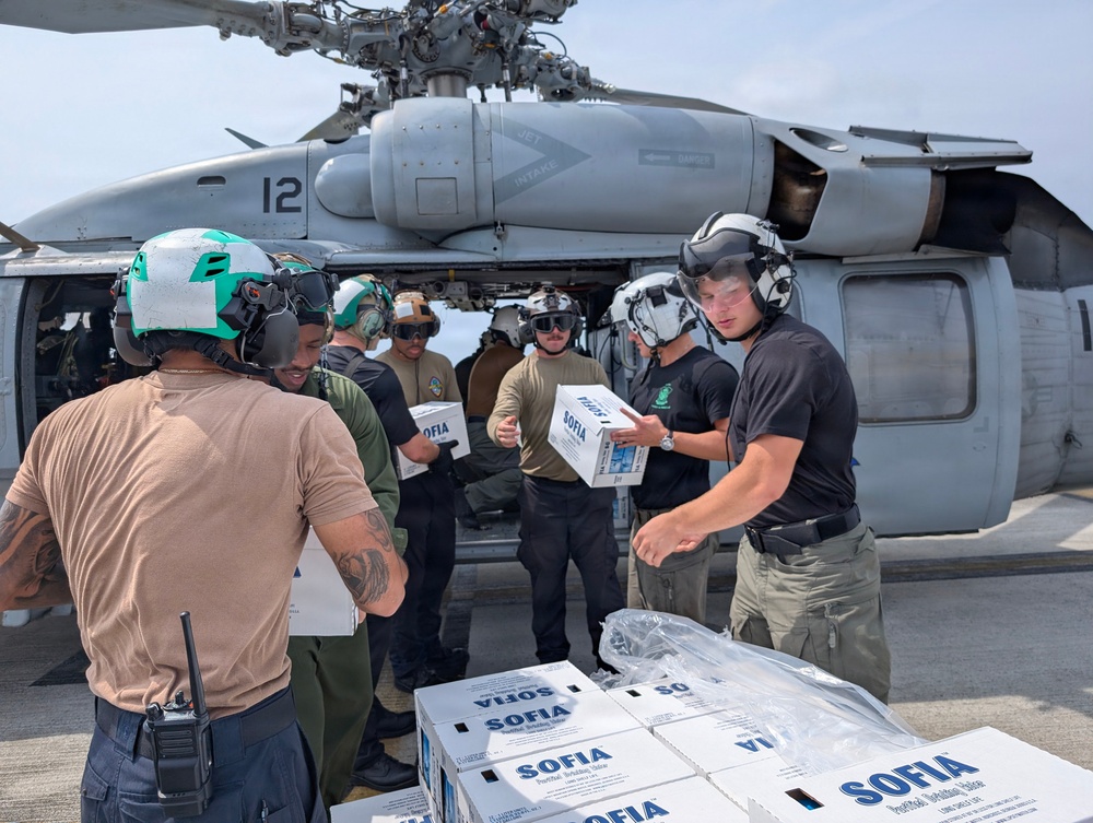Helicopter Sea Combat Squadron (HSC) 25 Sailors Respond To Super Typhoon Sinlaku