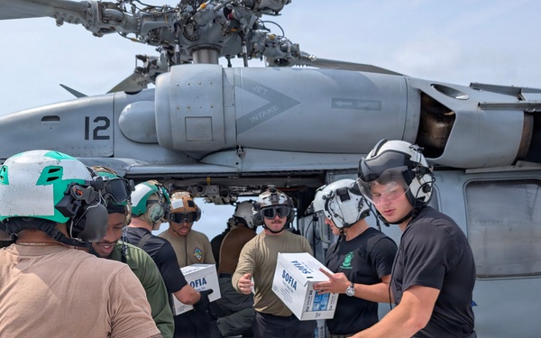 Helicopter Sea Combat Squadron (HSC) 25 Sailors Respond To Super Typhoon Sinlaku