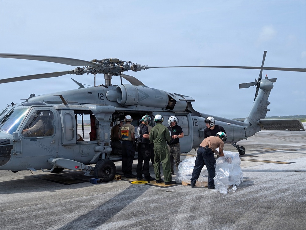 Helicopter Sea Combat Squadron (HSC) 25 Sailors Respond To Super Typhoon Sinlaku