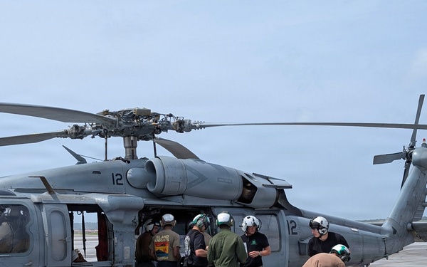 Helicopter Sea Combat Squadron (HSC) 25 Sailors Respond To Super Typhoon Sinlaku