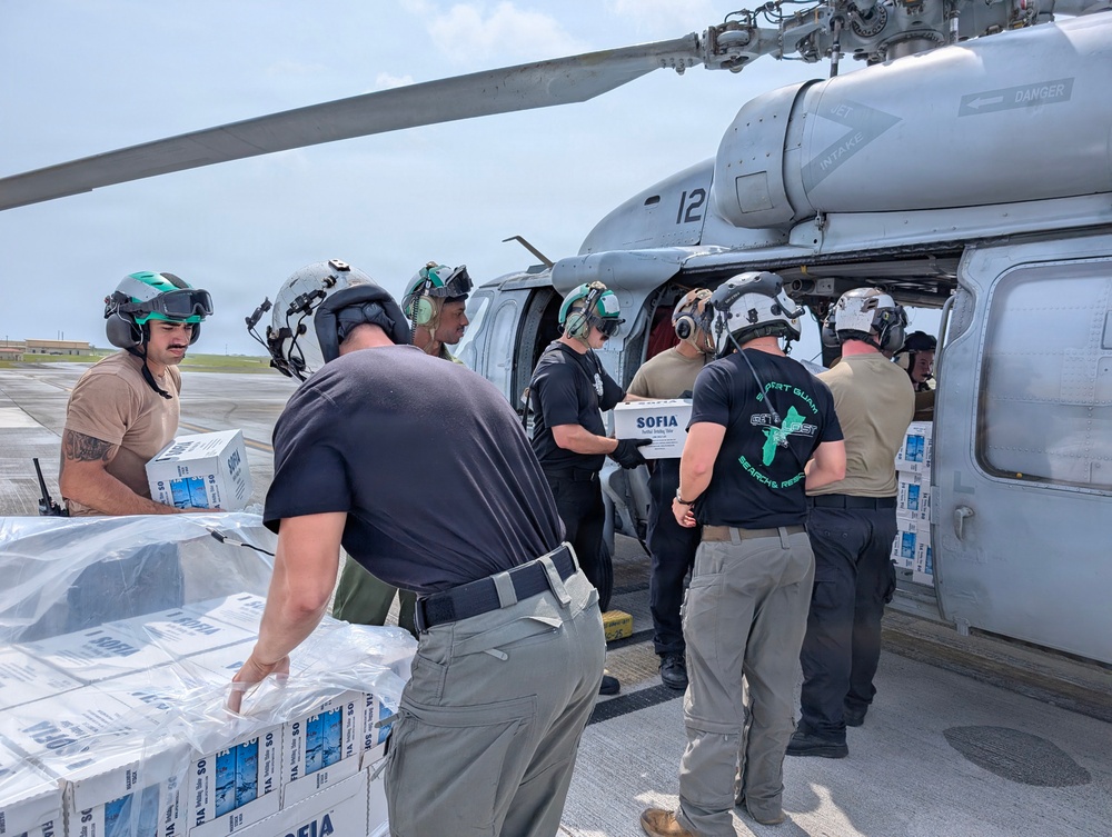 Helicopter Sea Combat Squadron (HSC) 25 Sailors Respond To Super Typhoon Sinlaku