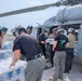 Helicopter Sea Combat Squadron (HSC) 25 Sailors Respond To Super Typhoon Sinlaku