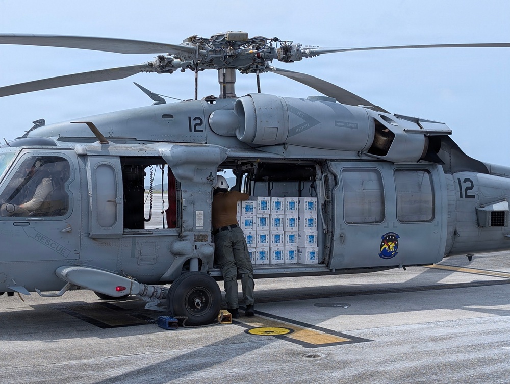 Helicopter Sea Combat Squadron (HSC) 25 Sailors Respond To Super Typhoon Sinlaku