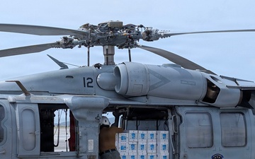 Helicopter Sea Combat Squadron (HSC) 25 Sailors Respond To Super Typhoon Sinlaku