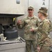Soldier explains kitchen capabilities during leader visit