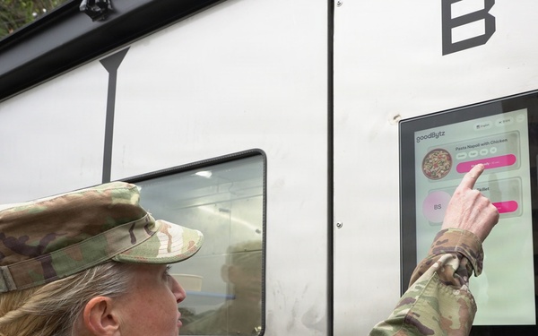 Senior leader interacts with autonomous kitchen interface