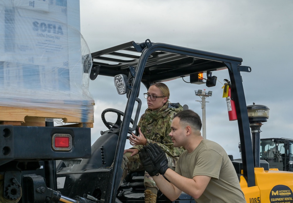 36th LRS unloads 27,000 liters of emergency water supplies from FEMA