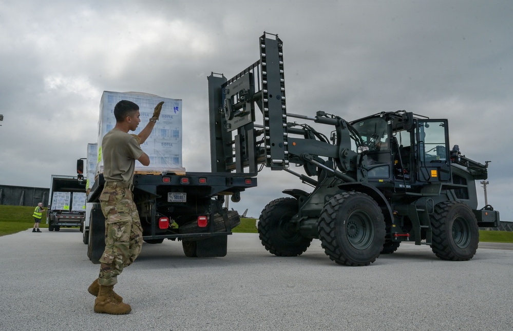 36th LRS unloads 27,000 liters of emergency water supplies from FEMA