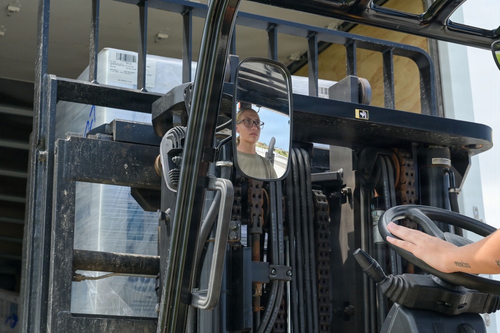 36th LRS unloads 27,000 liters of emergency water supplies from FEMA