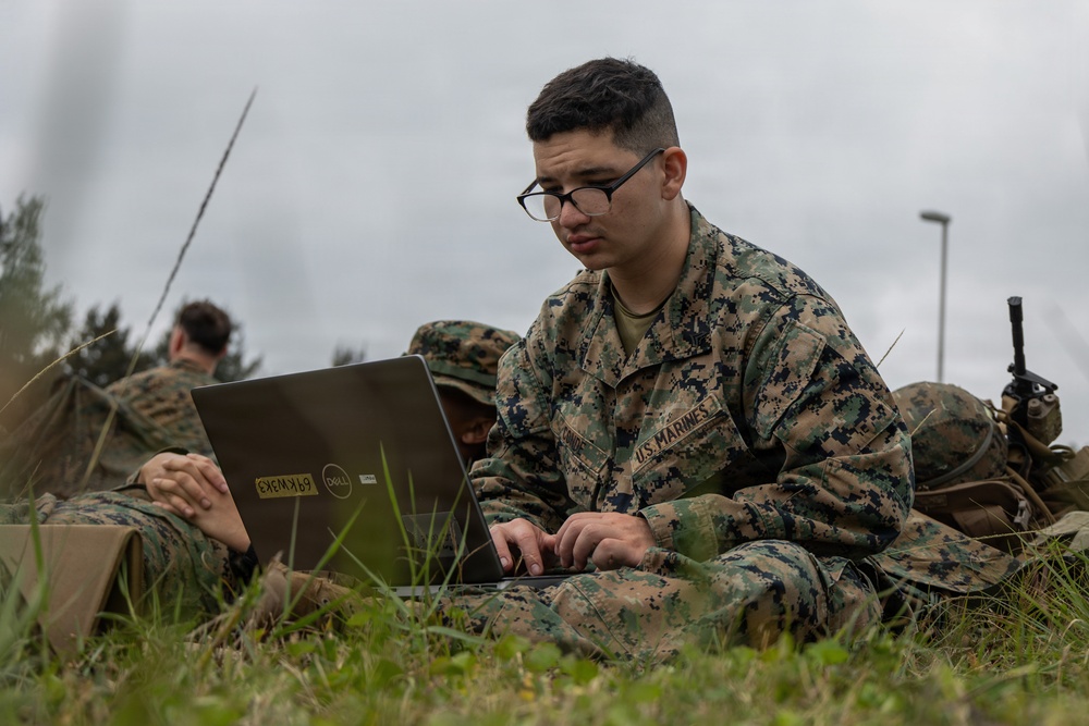 COMMSTRAT Marines conduct a field training exercise at Camp Hansen