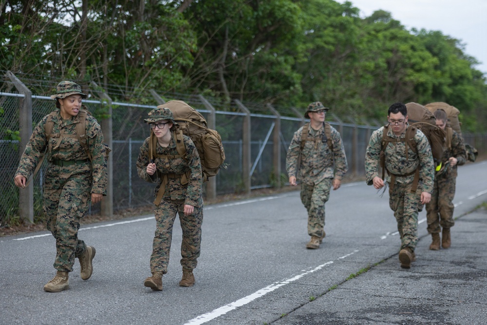 COMMSTRAT Marines conduct a field training exercise at Camp Hansen