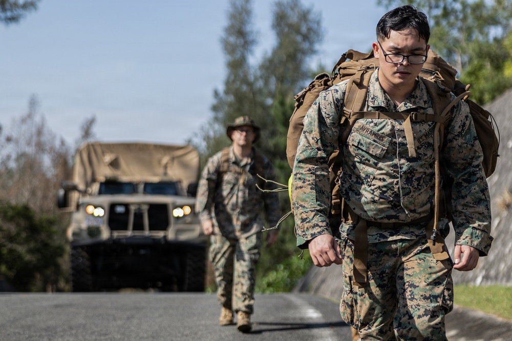 COMMSTRAT Marines conduct a field training exercise at Camp Hansen