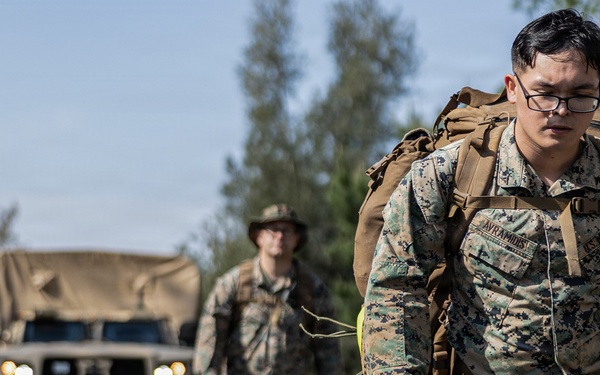 COMMSTRAT Marines conduct a field training exercise at Camp Hansen