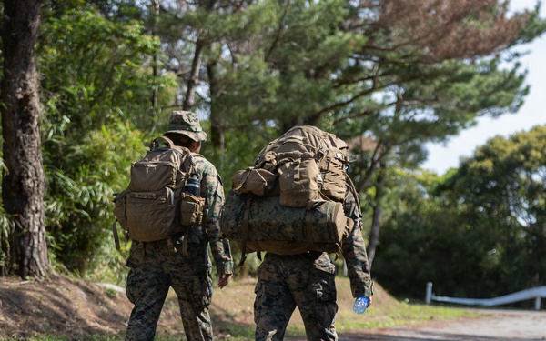 COMMSTRAT Marines conduct a field training exercise at Camp Hansen