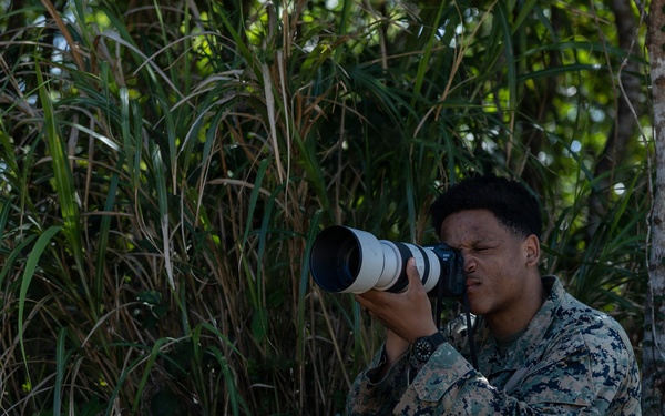 COMMSTRAT Marines conduct a field training exercise at Camp Hansen