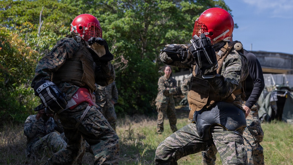 COMMSTRAT Marines conduct a field training exercise at Camp Hansen