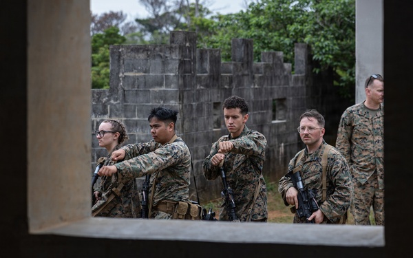 COMMSTRAT Marines conduct a field training exercise at Camp Hansen