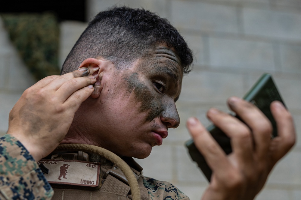 COMMSTRAT Marines conduct a field training exercise at Camp Hansen