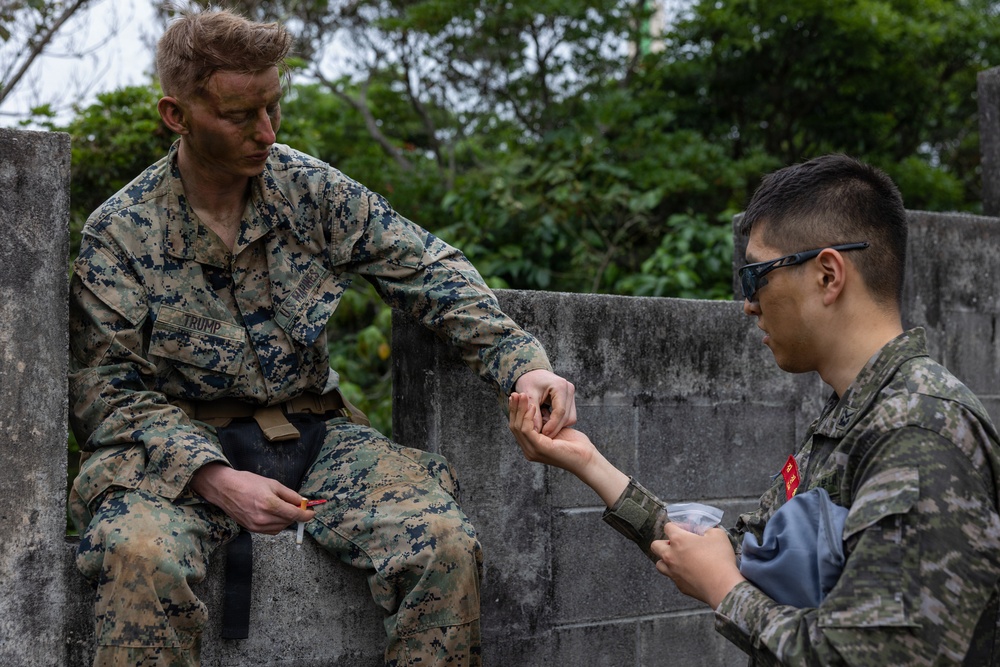 COMMSTRAT Marines conduct a field training exercise at Camp Hansen
