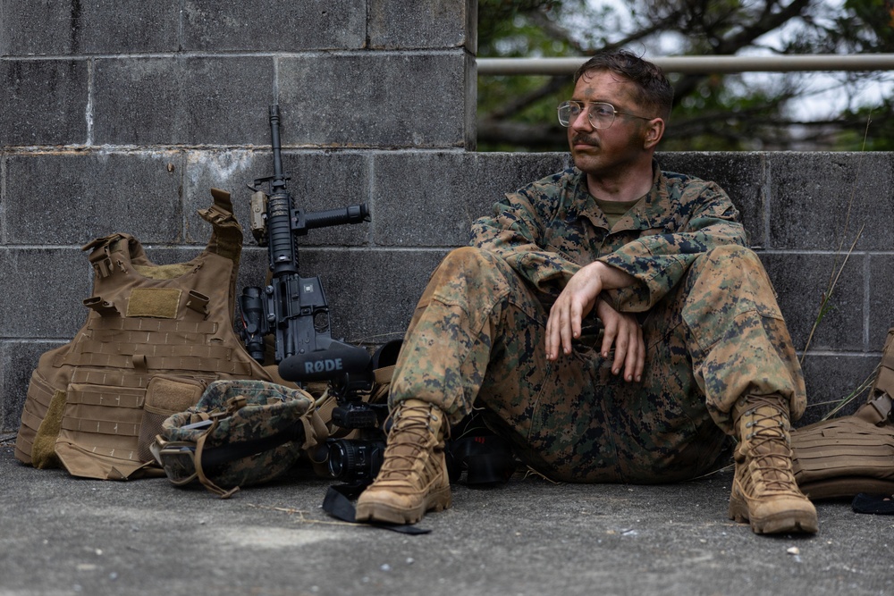 COMMSTRAT Marines conduct a field training exercise at Camp Hansen