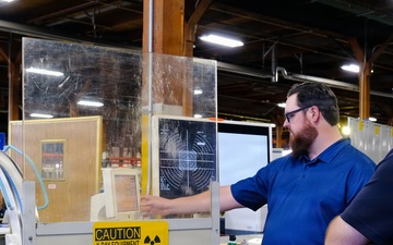 MMOD-CA maintainers inspect C-arm