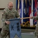 Lt. Col. Jeremy Mason uncases the colors for the newly established 304th Cyber Battalion, Army Reserve Cyber Protection Brigade at Camp Parks, Calif., on April 11, 2026.