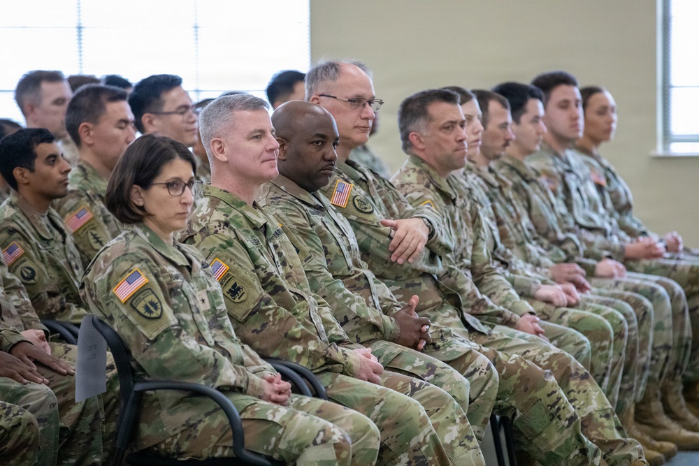 Brig. Gen. Kimberly Hamilton, Col. Andrew Walsh, Command Sgt. Maj. Edinri Magege, CW5 Robert Hembrook and the soldiers of the 304th Cyber Battalion gather at the battalion's Activation Ceremony at Camp Parks, Calif., on April 11, 2026.