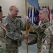 Lt. Col. Jeremy Mason passes the 304th Cyber Battalion's colors to Col. Andrew Walsh during the battalion's Change of Command Ceremony at Camp Parks, Calif., on April 11, 2026.