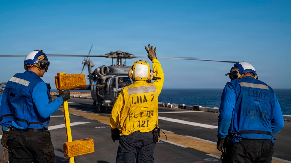 USS Tripoli Conducts Live-Hoist Training