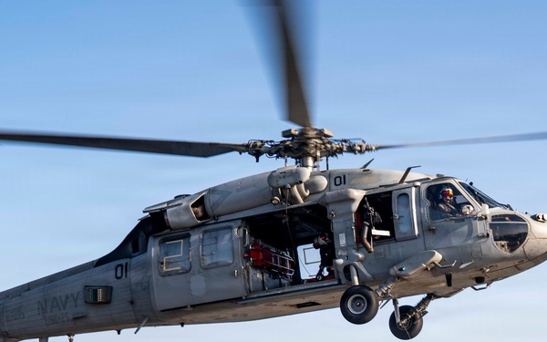 USS Tripoli Conducts Live-Hoist Training